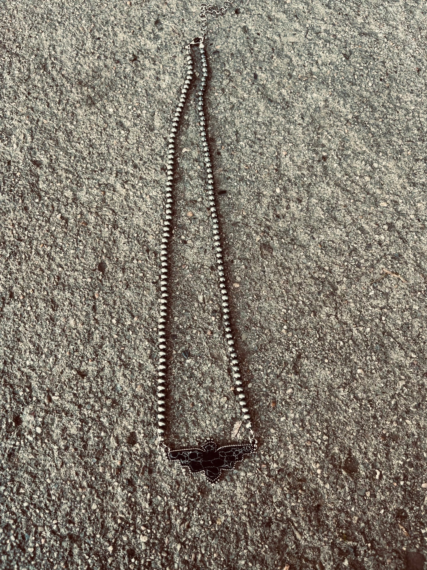 Black thunder bird necklace