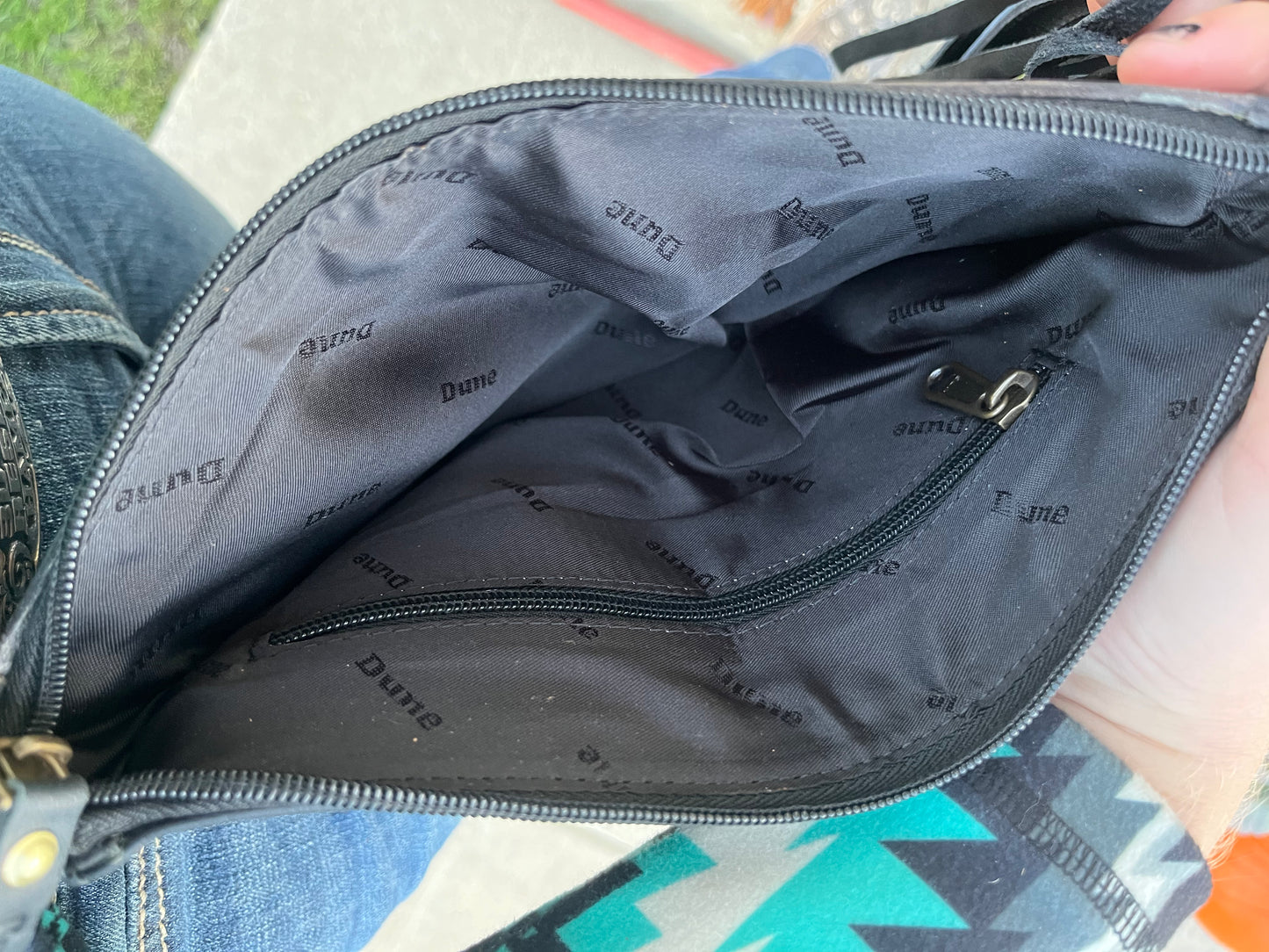 The blacked tooled crossbody