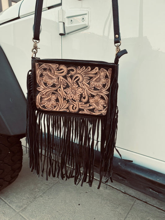 The blacked tooled crossbody