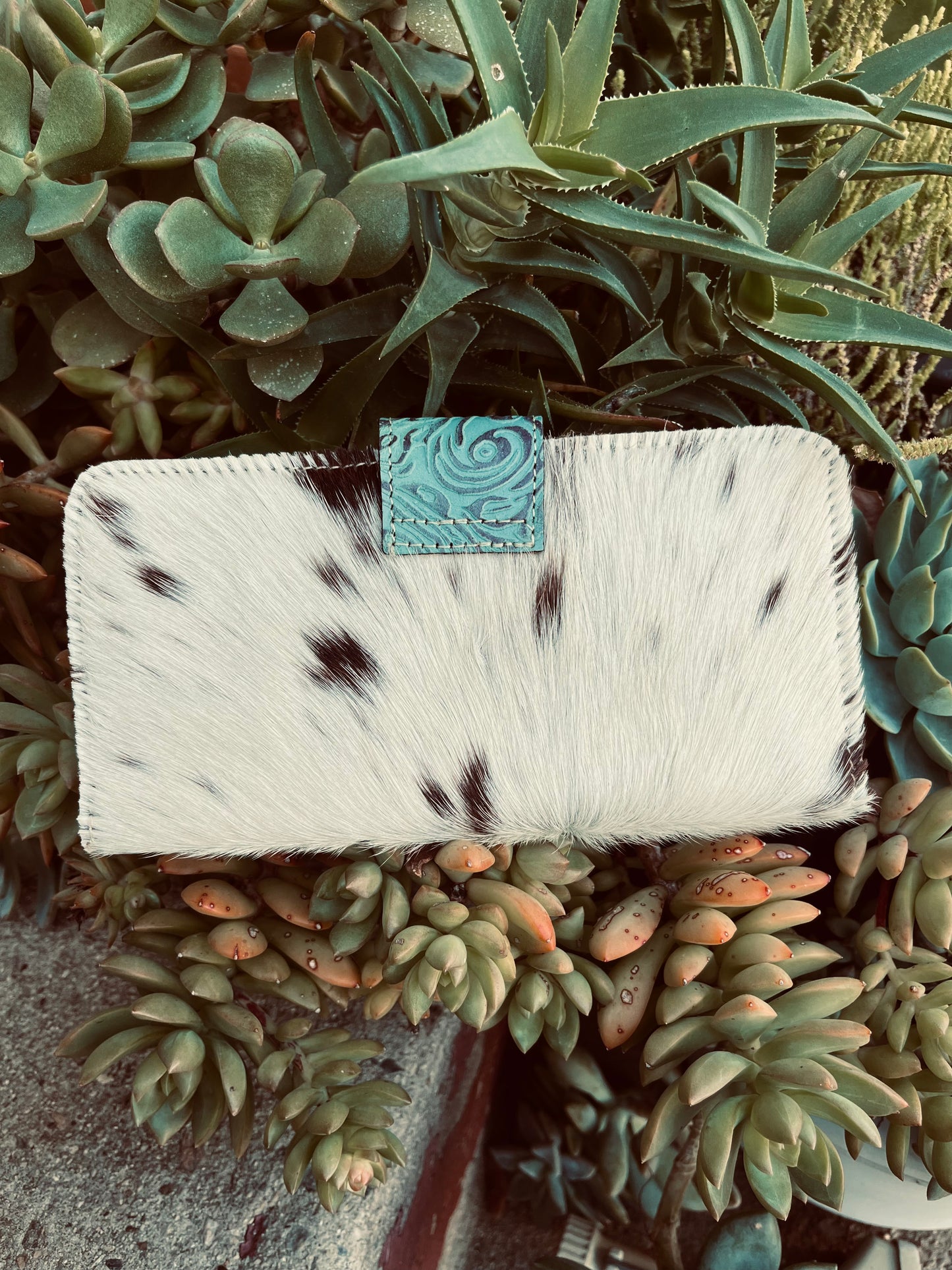 The tooled turquoise wallet