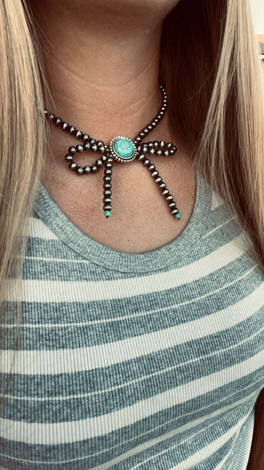 Turquoise bow tie choker