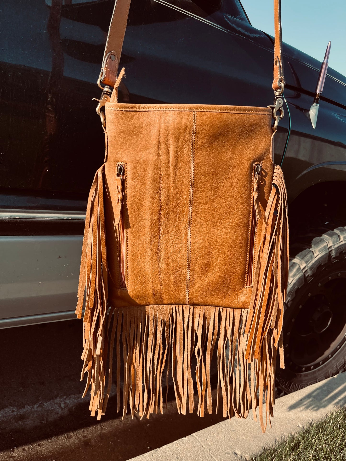 The buckstitch crossbody