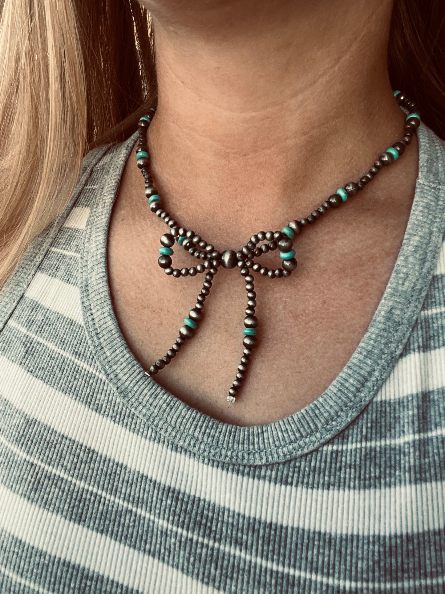 Turquoise bow tie choker