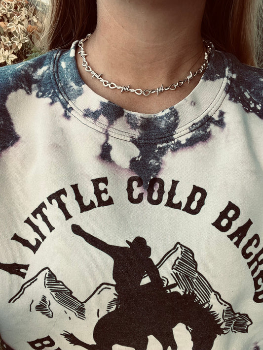 The barbed choker
