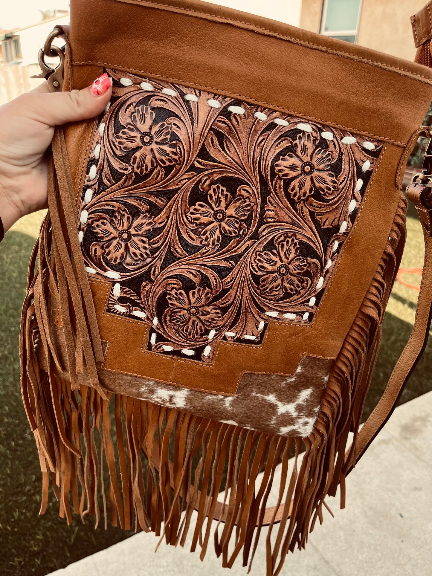 The buckstitch crossbody