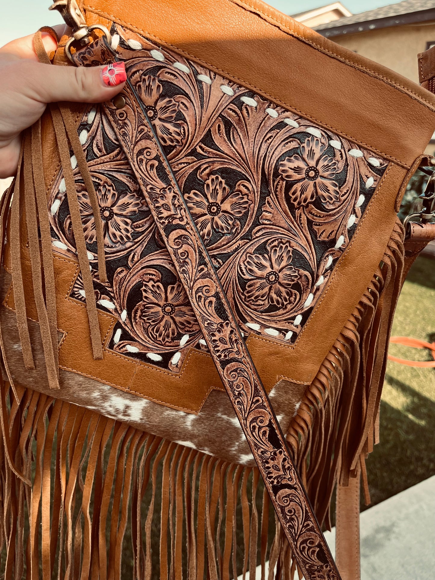 The buckstitch crossbody