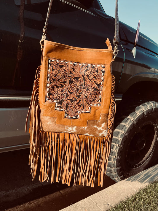 The buckstitch crossbody