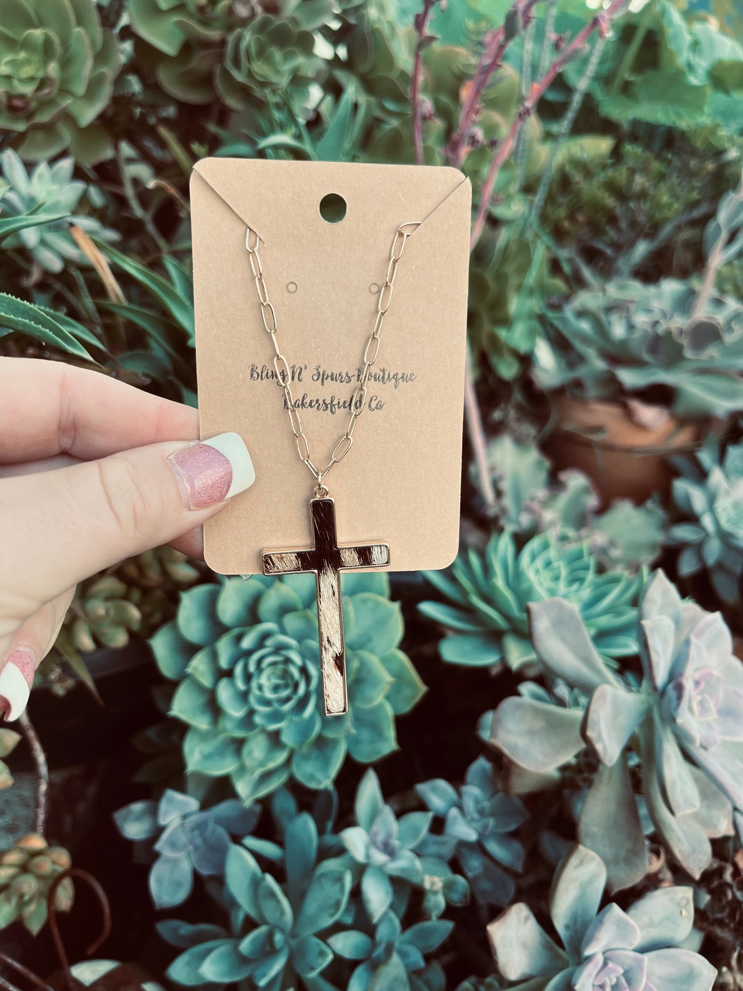 Cowhide gold cross necklace