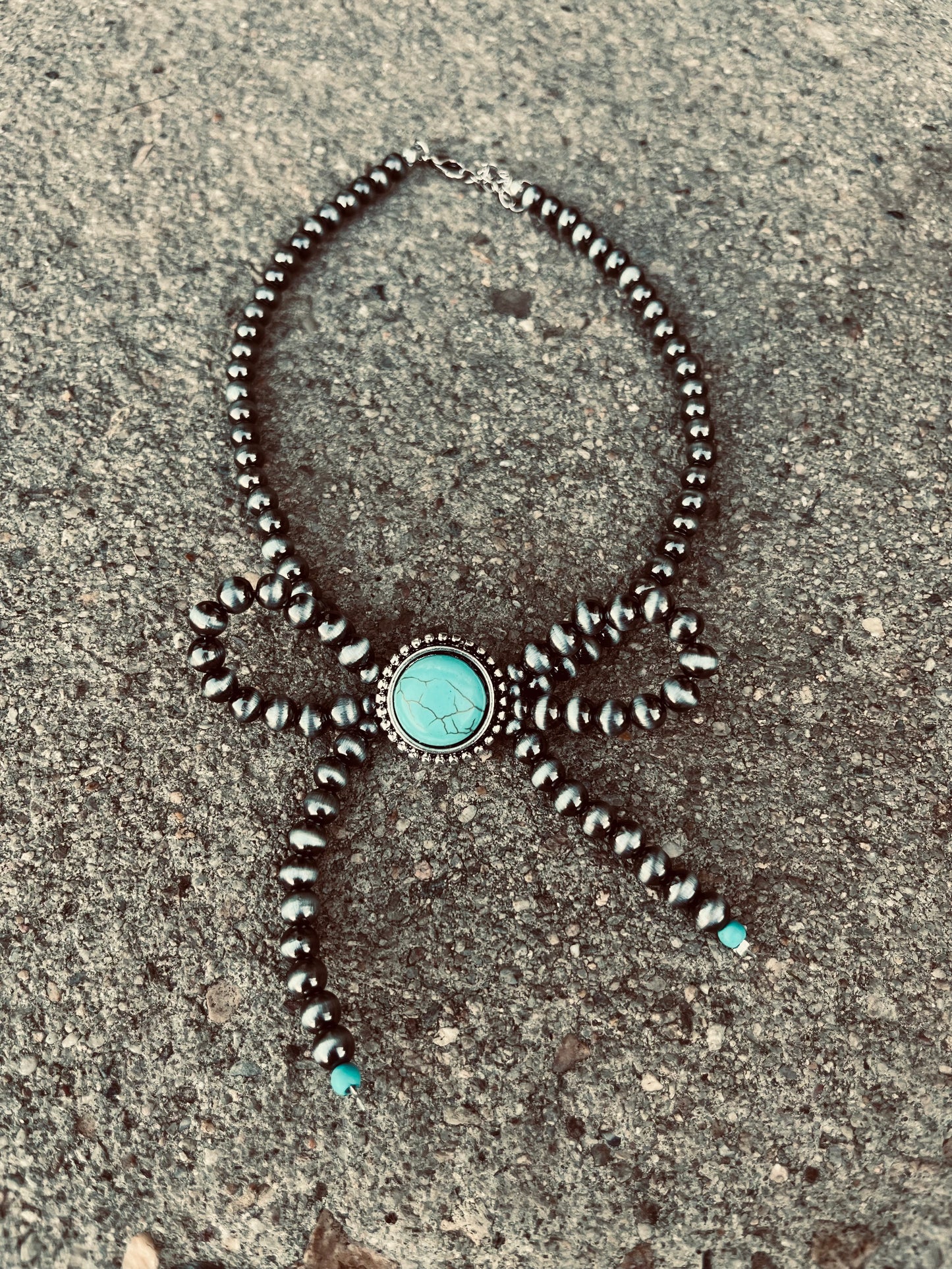 Turquoise bow tie choker
