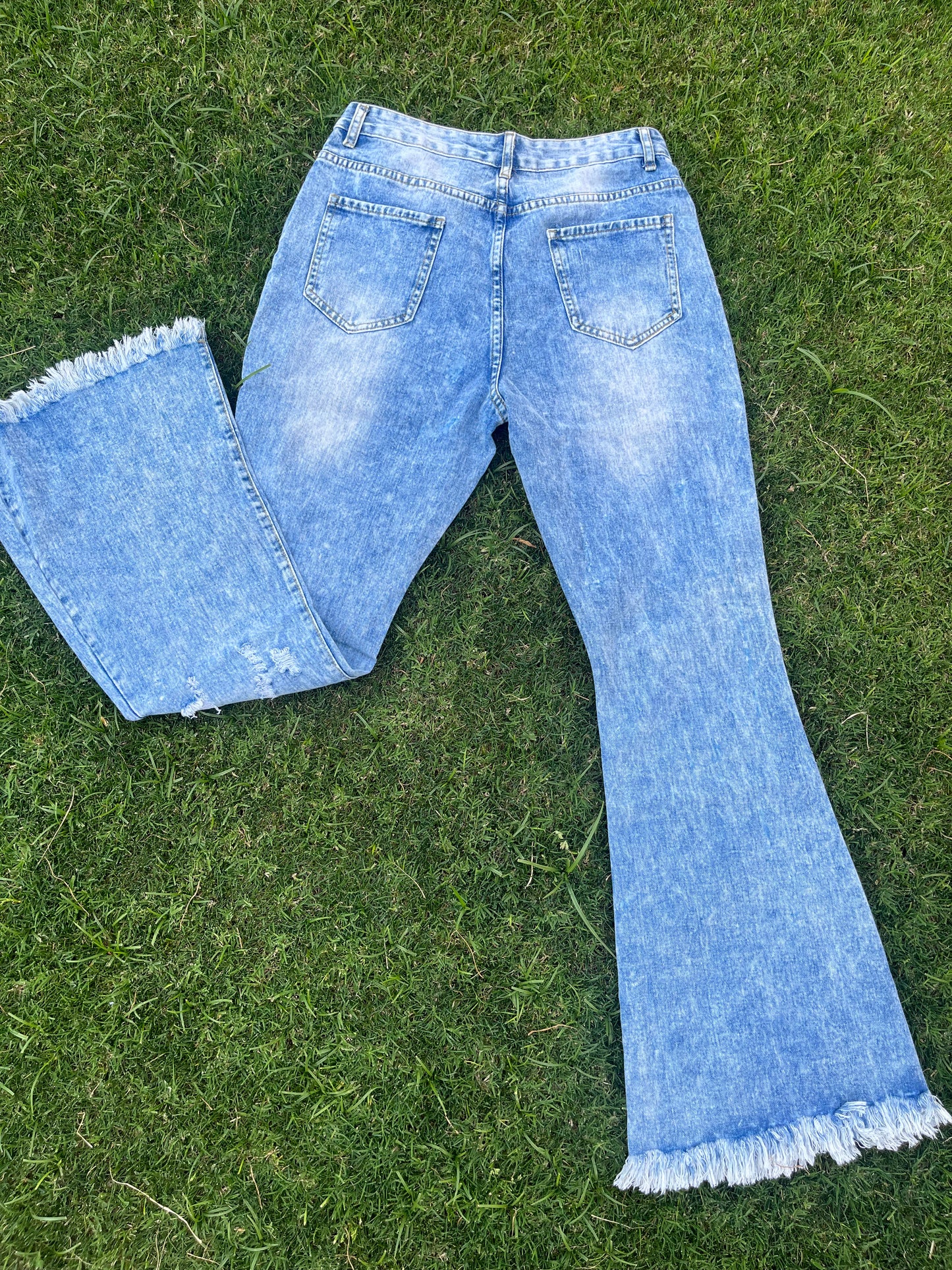 Acid washed ripped flares