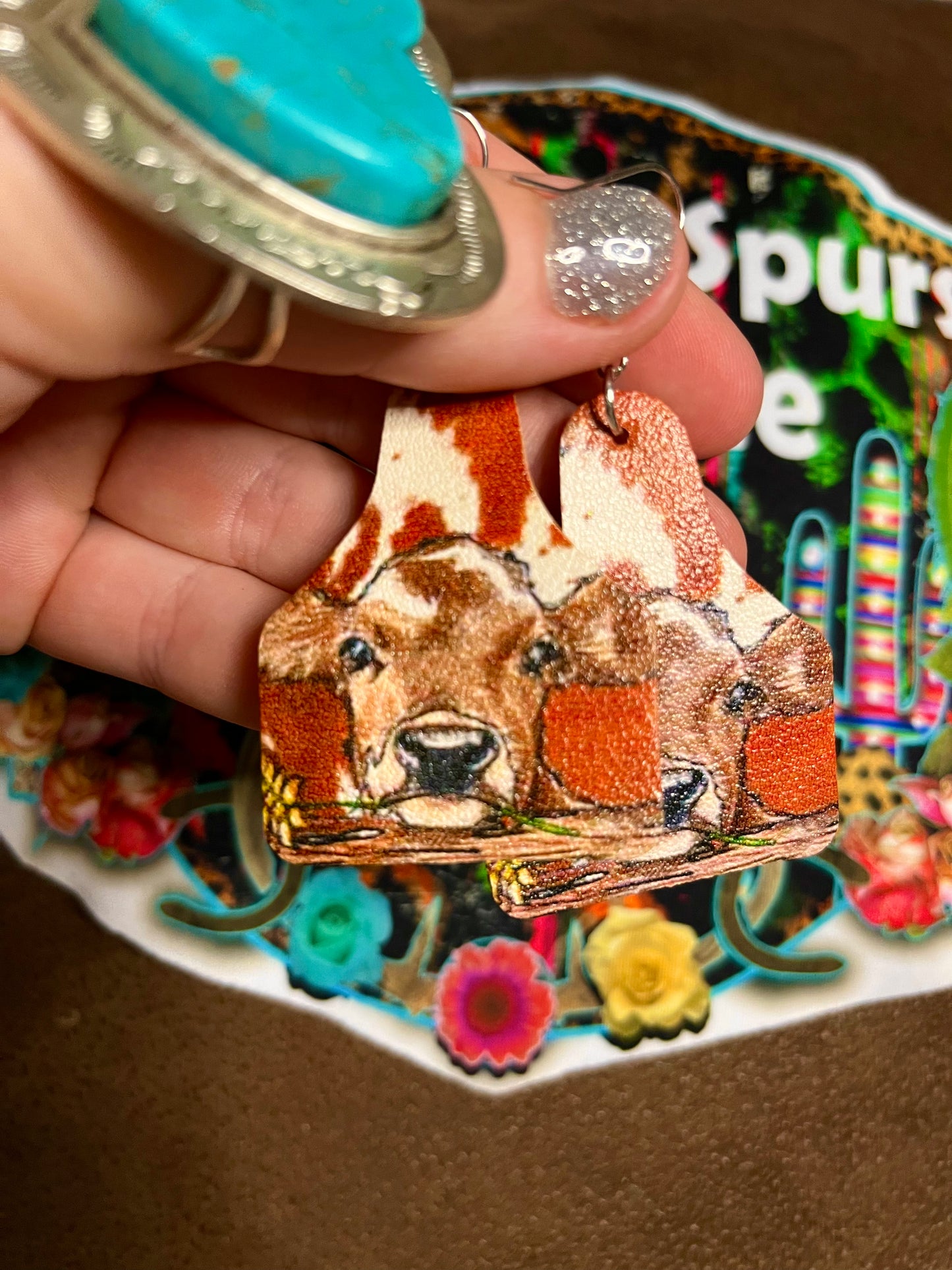 Cow tag earring