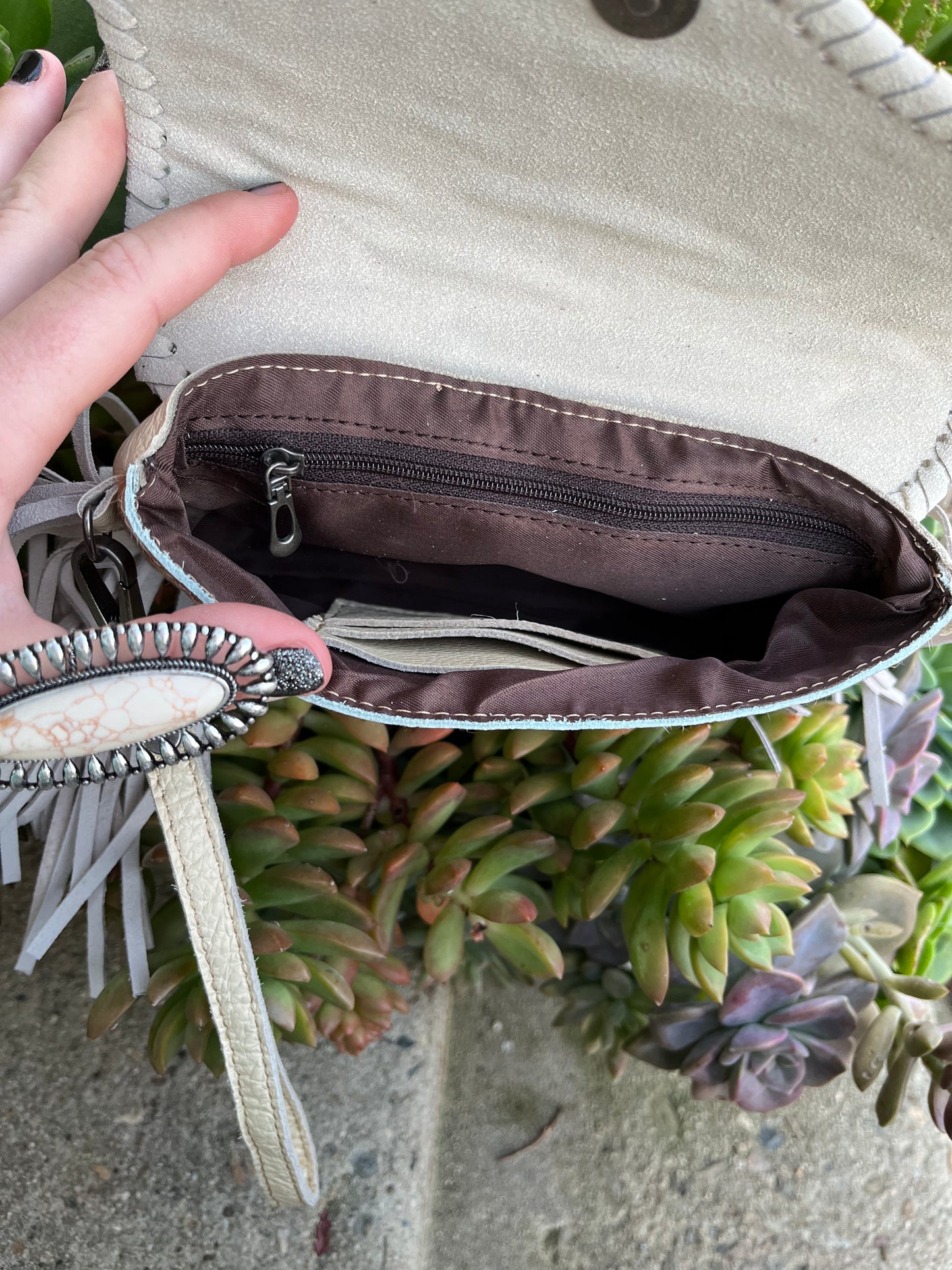 Tooled crossbody clutch