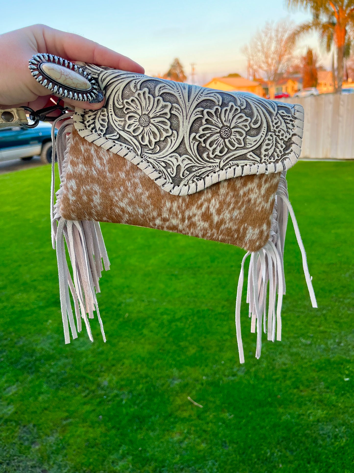 Tooled crossbody clutch