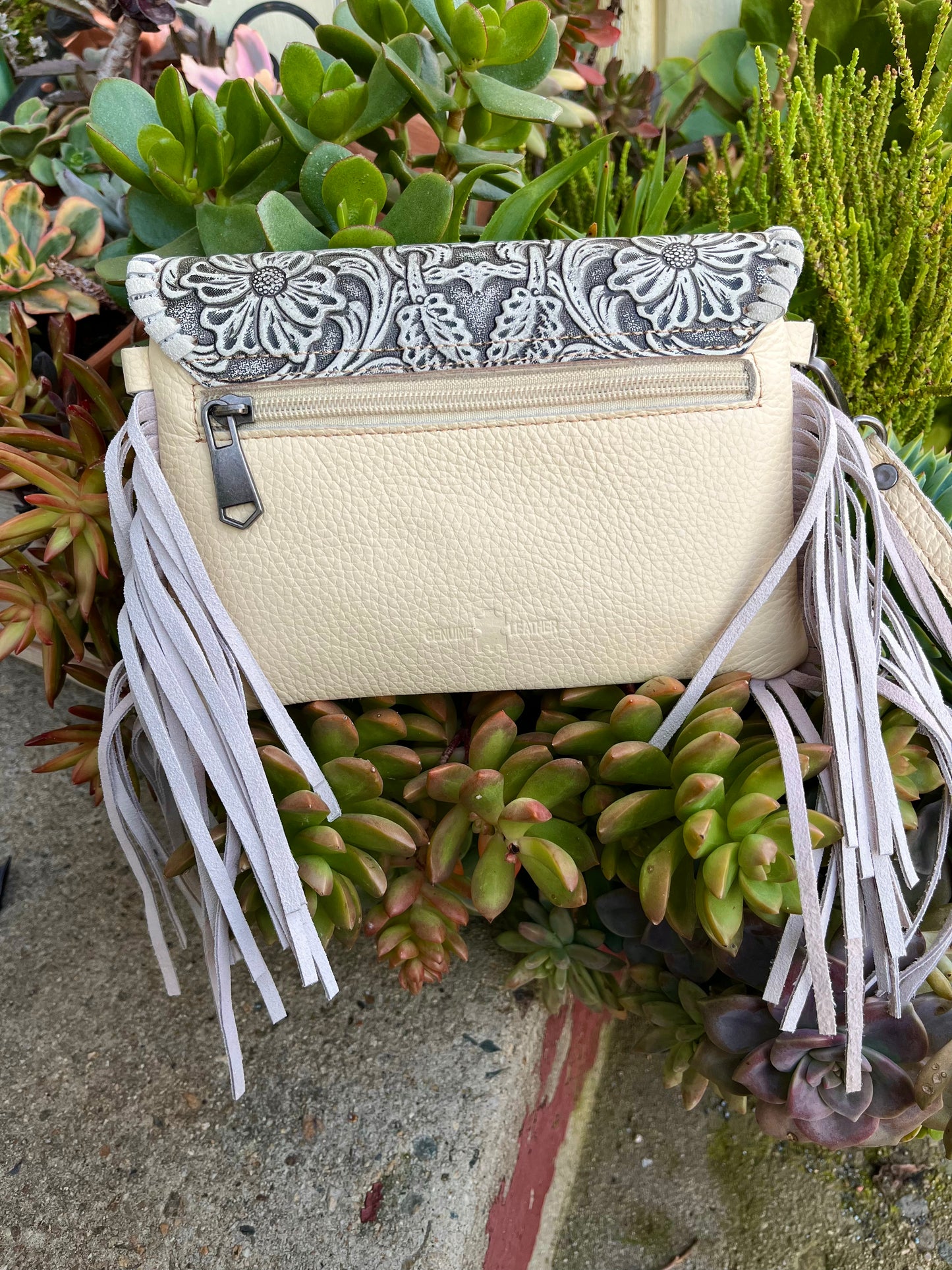 Tooled crossbody clutch